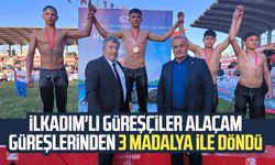 来自伊尔卡迪姆的摔跤手从阿拉坎摔跤比赛归来，获得 3 枚奖牌